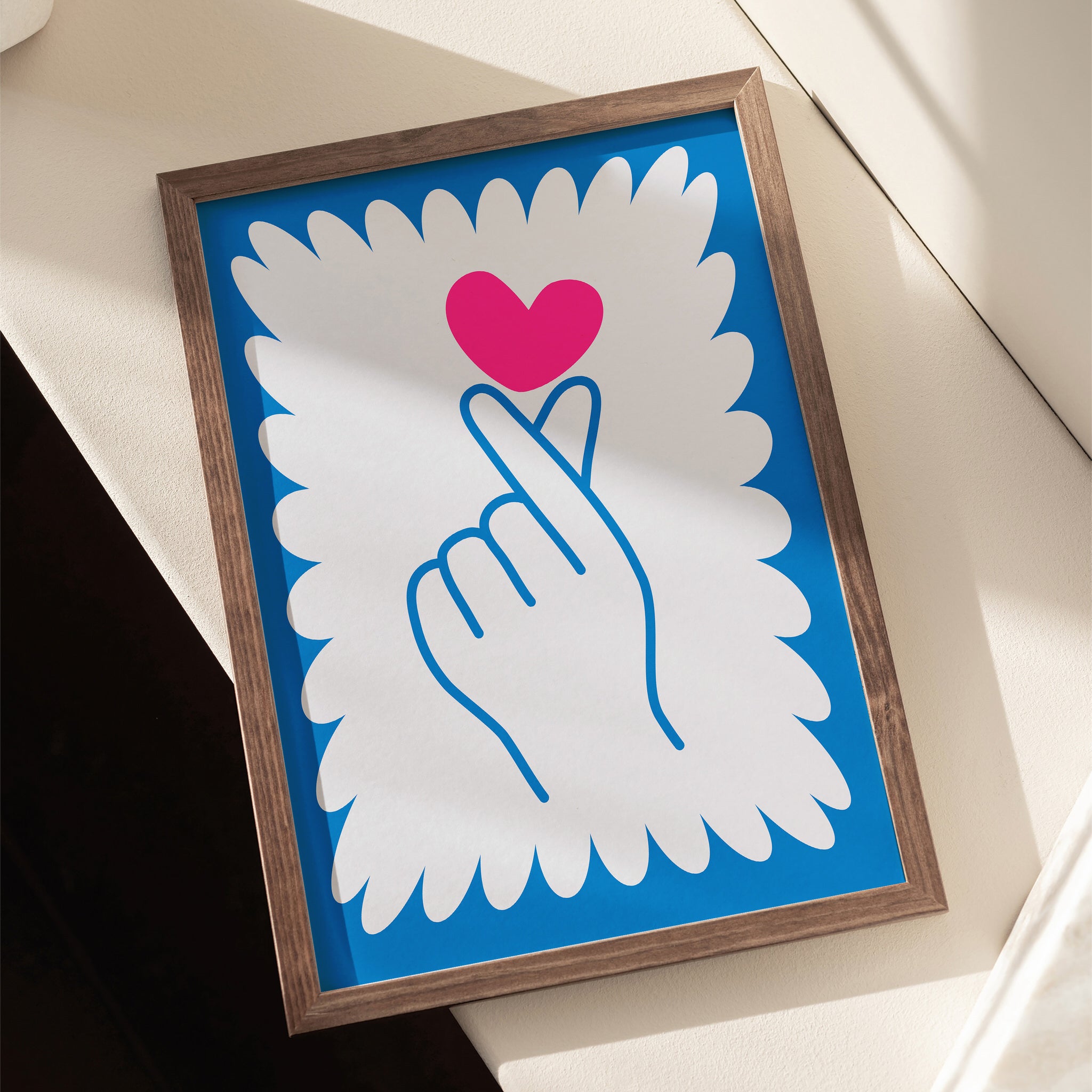Minimalist love sign art print with hand and heart symbol in pink and blue